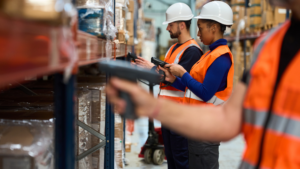Warehouse staff scanning inventory for the ecommerce order fulfillment process.